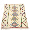 handcrafted cream rug